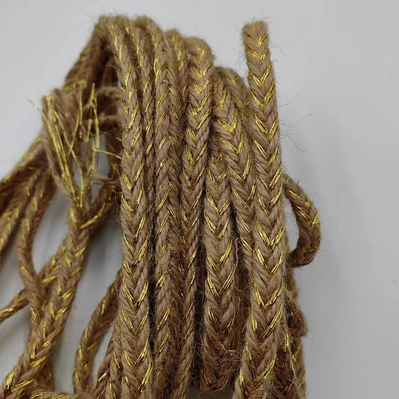 Matériaux écologiques Largeur personnalisée Tresses et feuilles de jute doré.