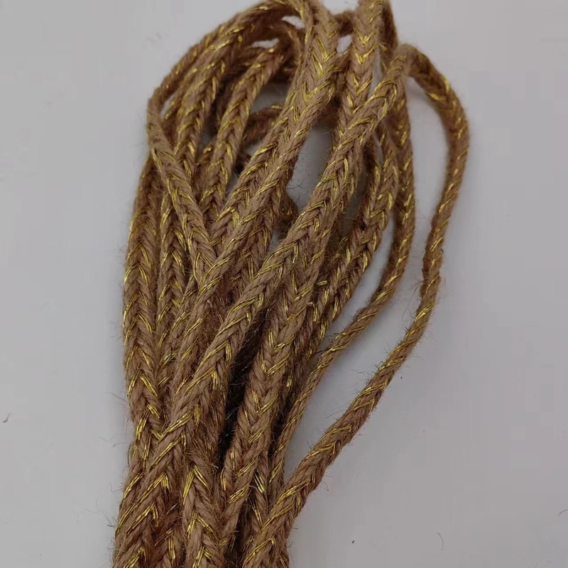 Matériaux écologiques Largeur personnalisée Tresses et feuilles de jute doré.